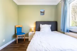 Immobilienfotograf Gästezimmer Luxushaus Bett